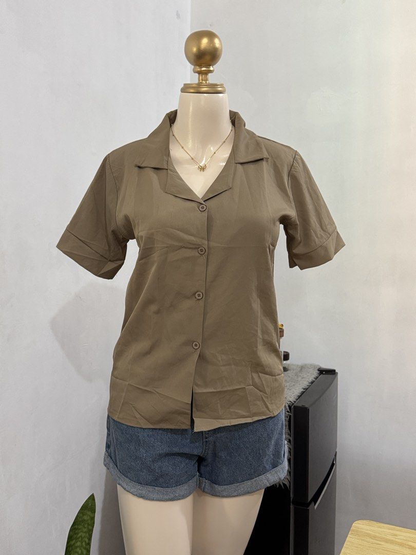 ETC LIGHT BROWN POLO BLOUSE (Category: Blouses) located in Dasmarinas. Submitted by ennahsthriftcollection (Listing ID 1468733495, Image 2). Description: ETC LIGHT BROWN POLO BLOUSE MEDIUM ON TAG new unused Width : 18 1/2 inches Length : 24 inches.