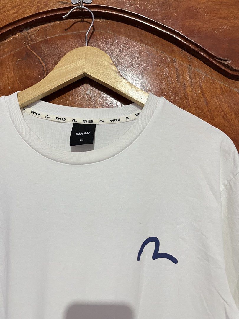 Evisu daicock Tshirt (Category: Tshirts & Polo Shirts ) located in Tumauini. Submitted by jomerthrift (Listing ID 1468888716, Image 3). Description: Dimes: 21.5x27 Color rate: 9.8/10 No issue No cracks No pinholes .