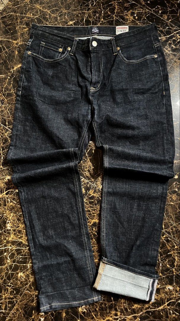 Evisu Slim Fit Camo Pocket Jeans (Category: Jeans) located in Tacloban City. Submitted by rxluminoque (Listing ID 1468832759, Image 1). Description: Size 34x40 - Brand: Evisu - Fit: Slim fit - Color: Clean dark indigo wash - Details: Camouflage back pockets with classic gull embroidery - Hardware: Branded metal buttons and leather back patch - Interior: Stamped typography graphics on pocket lining - Condition: Excellent .