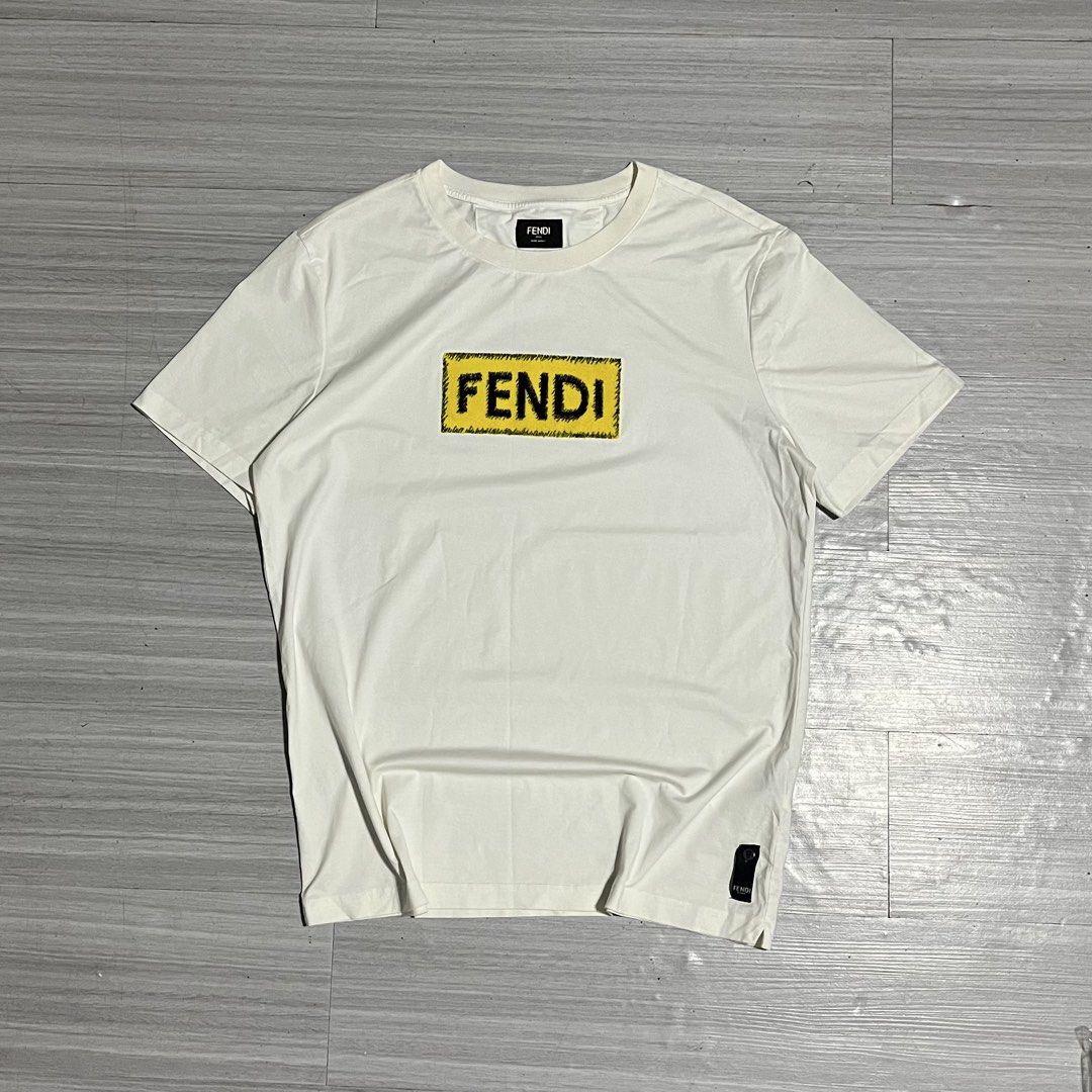 FENDI YELLOW BOX LOGO GRAPHIC (Category: Tshirts & Polo Shirts ) located in Iloilo. Submitted by thrift2cali (Listing ID 1468720050, Image 1). Description: ITEM NAME: F ÊND I DIMES: 20 / 26 SIZE: MEDIUM CONDITION: LIKE NEW ISSUE: NONE COLOR MAY VARY DUE TO LIGHTING - ADD SF OUTSIDE ILL CITY!.