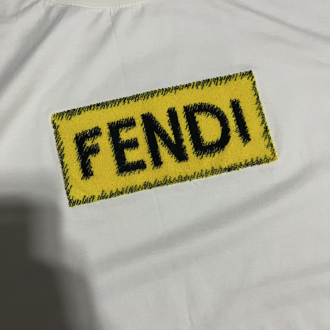 FENDI YELLOW BOX LOGO GRAPHIC (Category: Tshirts & Polo Shirts ) located in Iloilo. Submitted by thrift2cali (Listing ID 1468720050, Image 3). Description: ITEM NAME: F ÊND I DIMES: 20 / 26 SIZE: MEDIUM CONDITION: LIKE NEW ISSUE: NONE COLOR MAY VARY DUE TO LIGHTING - ADD SF OUTSIDE ILL CITY!.