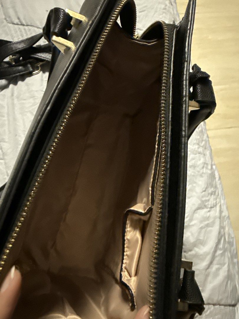 Figlia black structured handbag with shoulder strap (Category: Luxury Bags & Wallets) located in Caloocan City. Submitted by tootsief (Listing ID 1468864132, Image 2). Description: Original Price: 2,449 Never used.