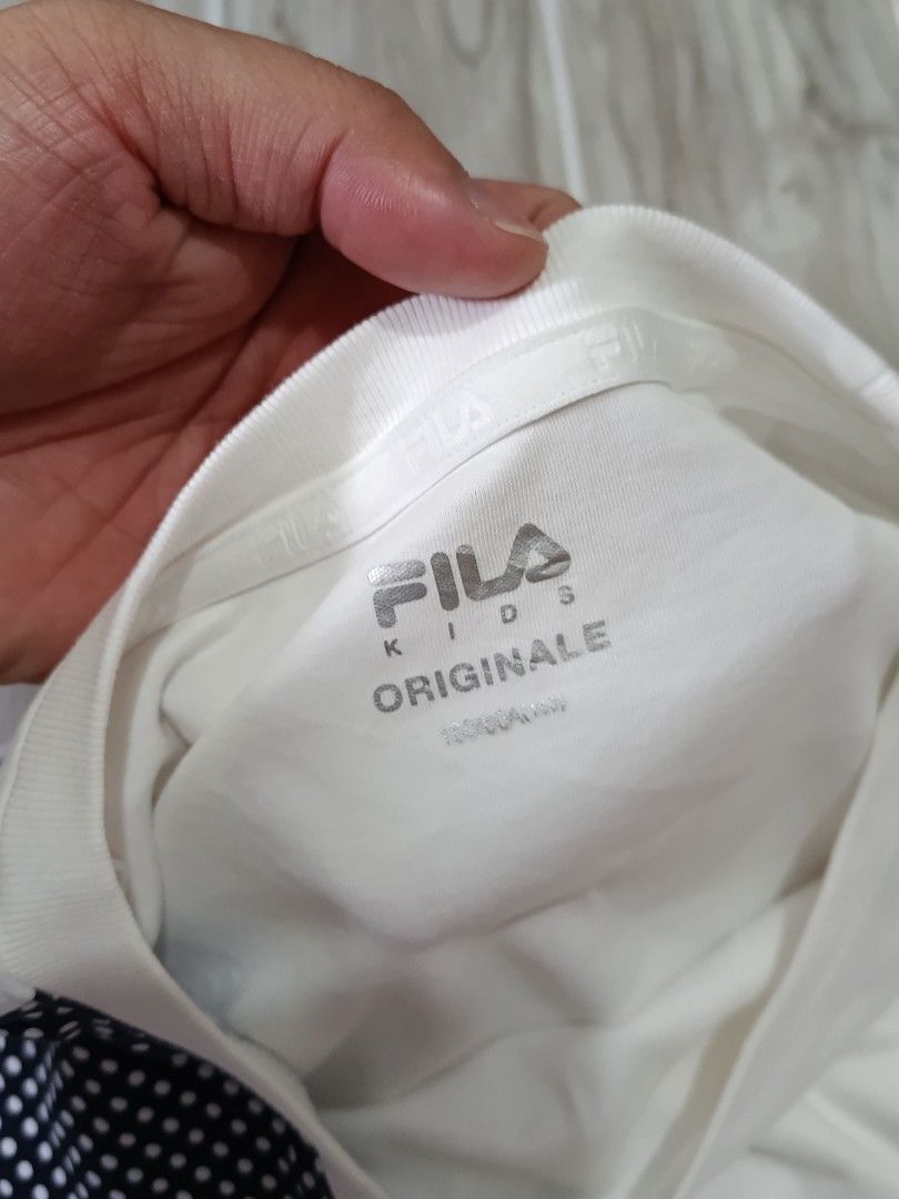 FILA SPORTS DRIFIT TSHIRT (freeshipping) (Category: Activewear) located in Quezon City. Submitted by gyl-stop (Listing ID 1468852142, Image 3). Description: free shipping 20 x 23 very good condi cr: 9.5/10 issue: dot stain.