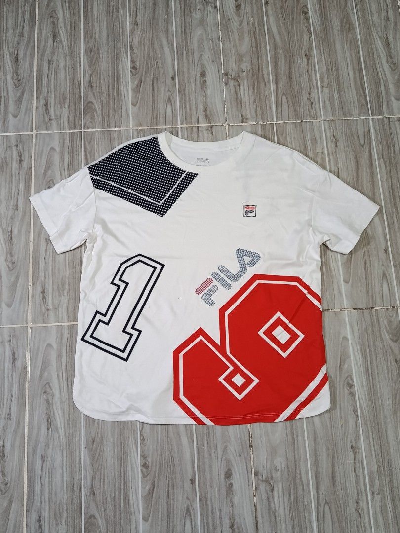 FILA SPORTS DRIFIT TSHIRT (freeshipping) (Category: Activewear) located in Quezon City. Submitted by gyl-stop (Listing ID 1468852142, Image 1). Description: free shipping 20 x 23 very good condi cr: 9.5/10 issue: dot stain.