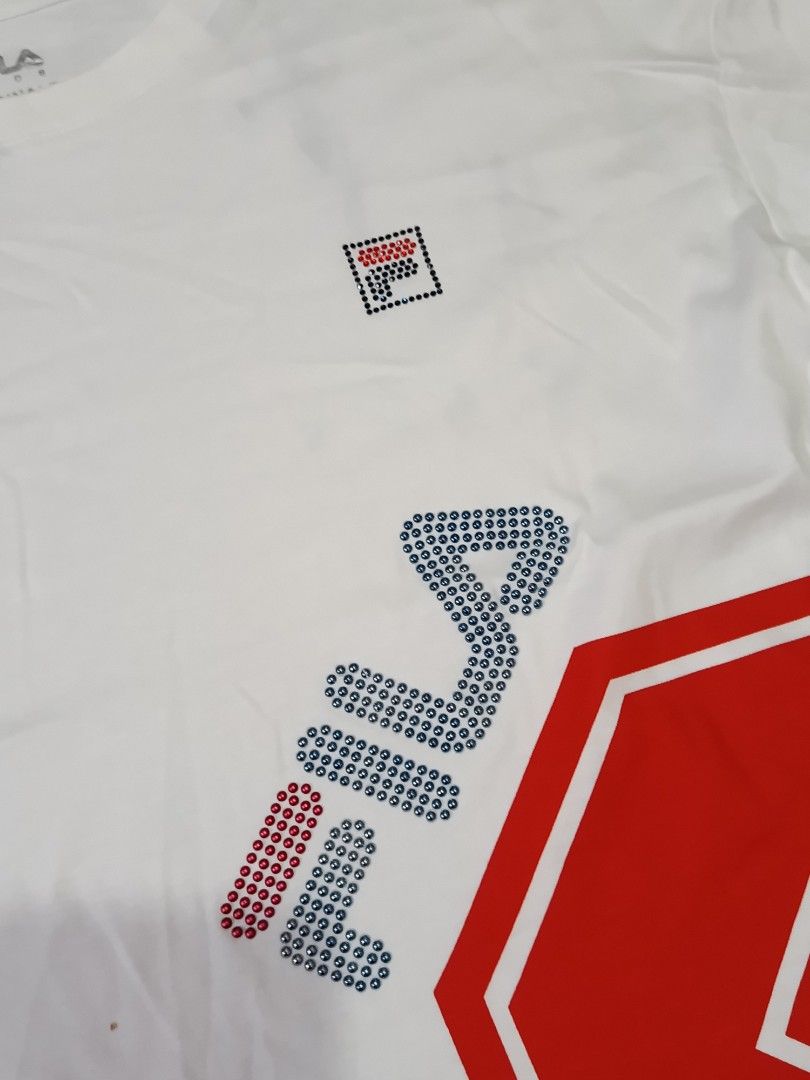 FILA SPORTS DRIFIT TSHIRT (freeshipping) (Category: Activewear) located in Quezon City. Submitted by gyl-stop (Listing ID 1468852142, Image 2). Description: free shipping 20 x 23 very good condi cr: 9.5/10 issue: dot stain.