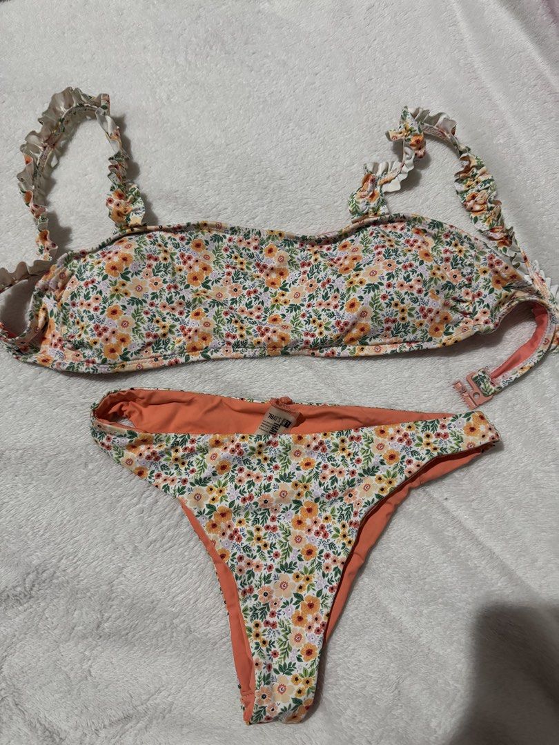 Floral Ruffle Bikini Set (Category: Bikinis & Swimsuits) located in Manila. Submitted by declutter.jasmin (Listing ID 1468769436, Image 2). Description: Fits to XS to Small Never been used Tondo or Qc loc.