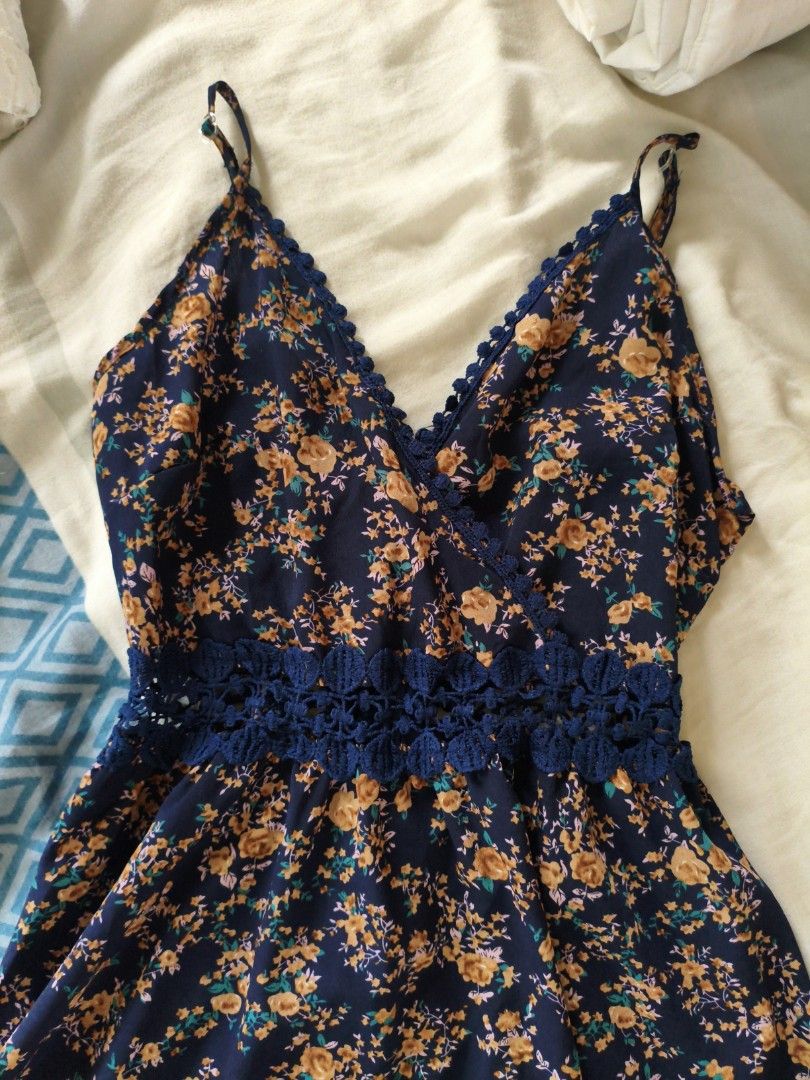Floral spaghetti strap dress (Category: Dresses) located in Manila. Submitted by bonsbotique (Listing ID 1468778444, Image 2). Description: for petite 30 bust size 30inch length nung dress msmo hindi kasama yung strap Adjustable strap po siya seller's body frame is: XS petite 30bust size height 4'9 39kg.