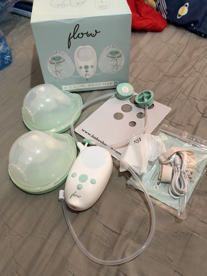 Flow X5 Electric Breast Pump (Category: Breastfeeding & Bottle Feeding) located in Manila. Submitted by chattyzsar14093 (Listing ID 1468762779, Image 1). Description: - Item: Flow X5 Electric Breast Pump Set - Color: Green and White - Condition: new unused pump, complete set in original box, cup lang nagamit - Inclusions: Main pump unit, double collection cups, tubing, and charging cable P2000.