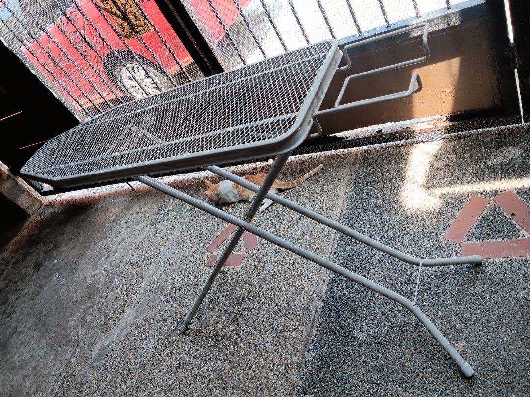 Folding Ironing Board with Mesh Top and Iron Rest (Category: Irons & Steamers) located in Las Pinas. Submitted by jesus1smysavi0r (Listing ID 1468737327, Image 1). Description: - Sturdy folding ironing board with mesh top for optimal steam flow - Built-in metal rack at the end for securely resting your iron - Gray tubular steel frame with cross-leg design for stability - Folds flat easily for convenient space-saving storage - Condition: Fully fun
