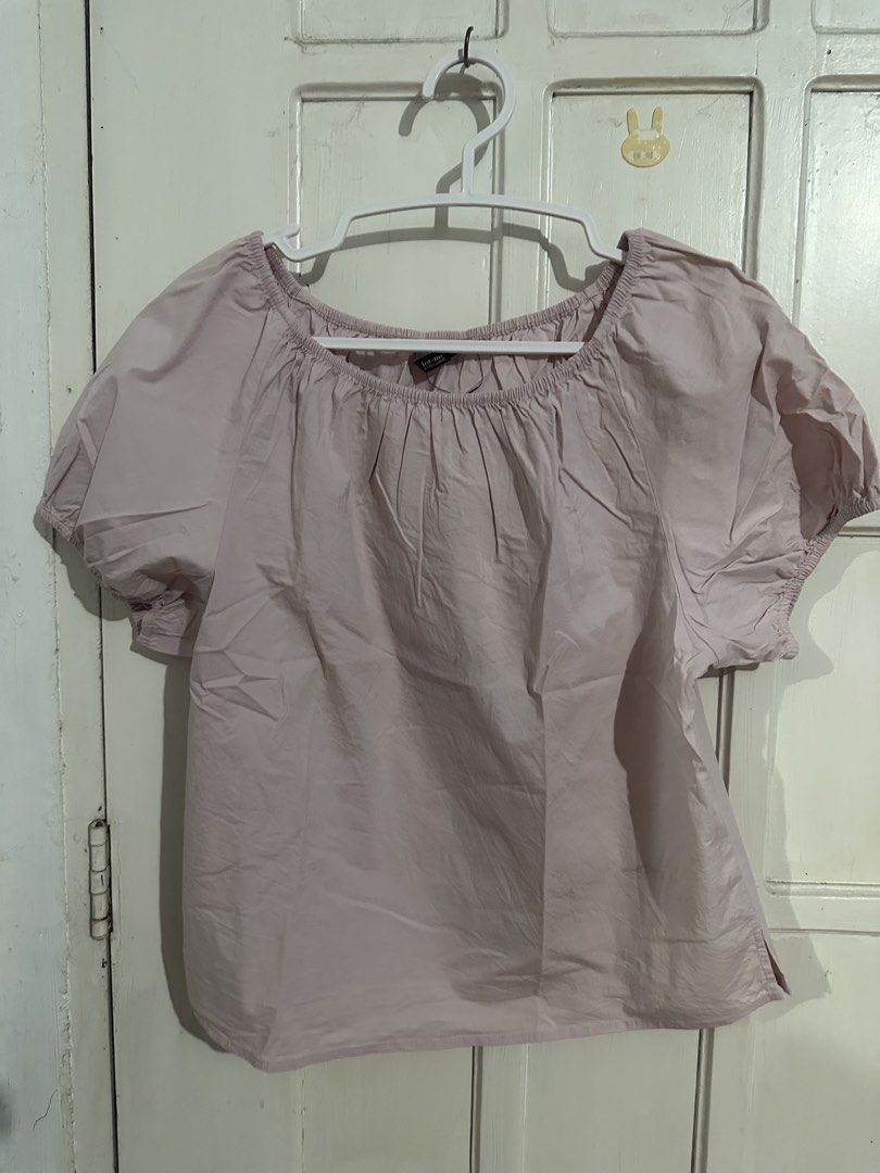 For Me Pink Off Shoulder Blouse (Category: Blouses) located in Naga. Submitted by leelovella64554 (Listing ID 1468778427, Image 1). Description: - Brand: For Me - Size: XL - Color: Neutral pastel pink - Style: Off-shoulder with gathered neckline - Sleeves: Short puff sleeves with elastic cuffs - Fit: Relaxed fit - Fabric: Lightweight and comfortable - Versatile: Easy to pair with jeans or skirts.