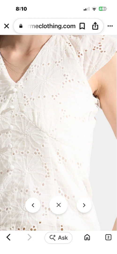 For Me White Eyelet Button-Down Blouse (Category: Blouses) located in Naga. Submitted by leelovella64554 (Listing ID 1468777516, Image 3). Description: - Brand: For Me - Style: White eyelet blouse with V-neckline and small fabric buttons - Sleeves: Short flutter sleeves - Material: Lightweight cotton with all-over cutout floral patterns - Details: Fully lined body, convenient side zipper closure - Condition: Clean and ready to wear.