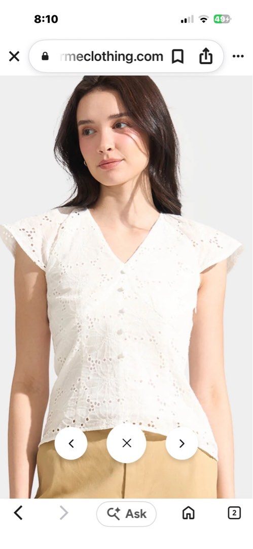 For Me White Eyelet Button-Down Blouse (Category: Blouses) located in Naga. Submitted by leelovella64554 (Listing ID 1468777516, Image 2). Description: - Brand: For Me - Style: White eyelet blouse with V-neckline and small fabric buttons - Sleeves: Short flutter sleeves - Material: Lightweight cotton with all-over cutout floral patterns - Details: Fully lined body, convenient side zipper closure - Condition: Clean and ready to wear.