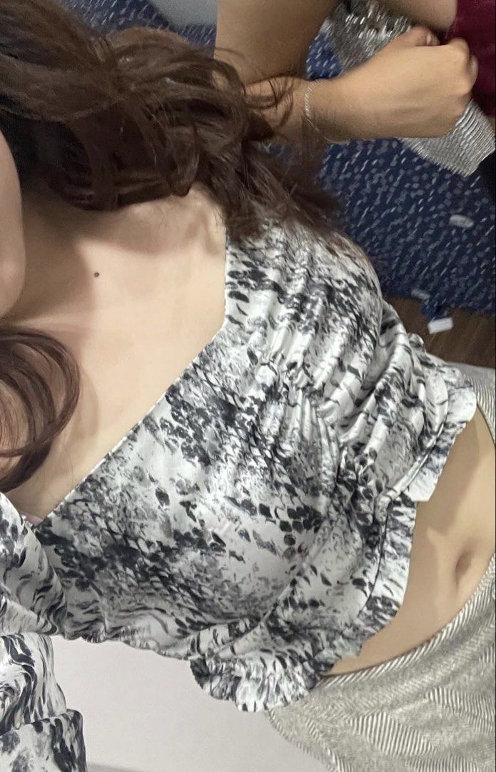 Forever 21 Snake Print Crop Top Size M (Category: Blouses) located in Manila. Submitted by caeln (Listing ID 1468761398, Image 3). Description: - Brand: Forever 21 - Size: M - Pattern: Grey snake print - Design: Square neckline, long sleeves with slight puff, ruched front detail - Fit: Cropped length above the waist - Material: Smooth, lightweight satin-like fabric - Styling: Perfect to pair with high-waisted denim or skirts for a night out.