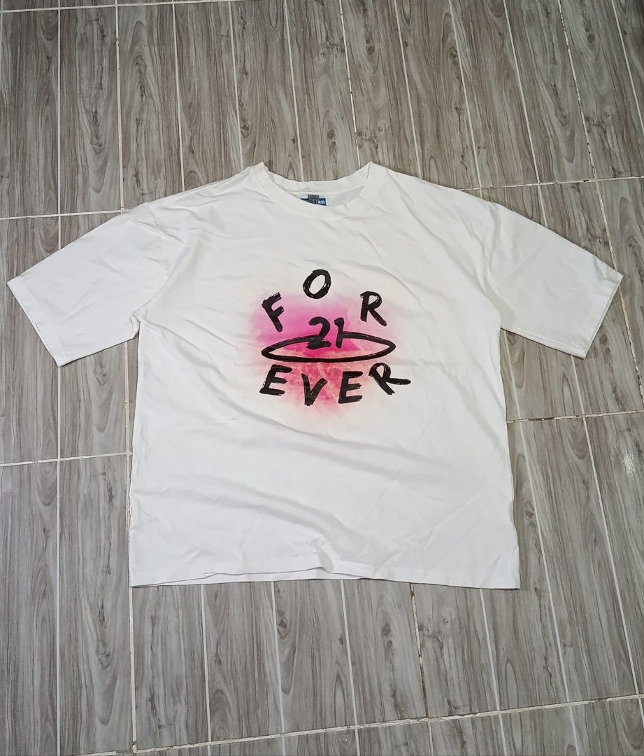 FOREVER 21 TSHIRT (freeshipping) (Category: Tshirts & Polo Shirts ) located in Quezon City. Submitted by gyl-stop (Listing ID 1468738863, Image 1). Description: free shipping 23 x 27.5 excellent condi cr: 9.8/10 issue: none.