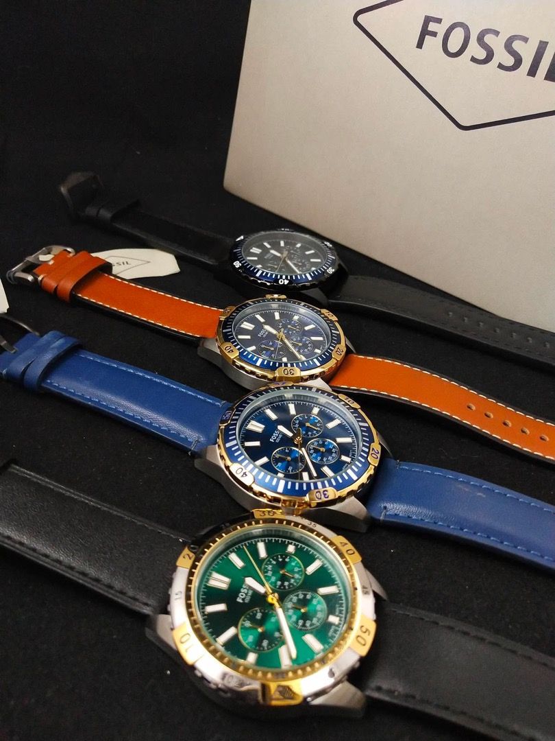Fossil Chronograph Watch (Category: Men's Watches) located in Manila. Submitted by andeonne (Listing ID 1468749369, Image 1). Description: Authentic Fossil chronograph watches for sale! Featuring stylish stainless steel cases, tachymeter bezels, and genuine leather straps. Available in multiple colorways like blue/gold, green/gold, all-blue, and classic black. Every piece comes brand new with its original Fossil tin box. Perfect for gifting or da