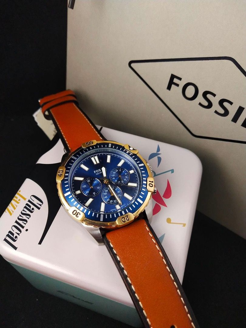Fossil Chronograph Watch (Category: Men's Watches) located in Manila. Submitted by andeonne (Listing ID 1468749369, Image 2). Description: Authentic Fossil chronograph watches for sale! Featuring stylish stainless steel cases, tachymeter bezels, and genuine leather straps. Available in multiple colorways like blue/gold, green/gold, all-blue, and classic black. Every piece comes brand new with its original Fossil tin box. Perfect for gifting or da