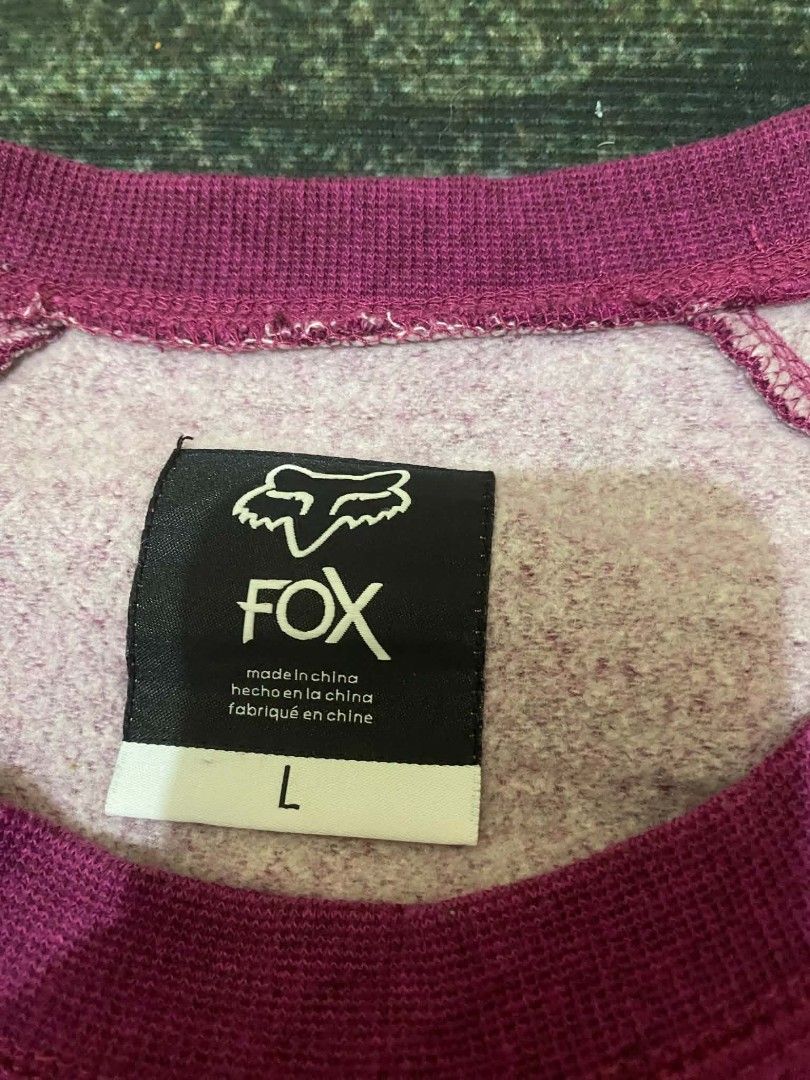 Fox Racing Purple Pullover Sweatshirt Size L (Category: Longsleeves) located in Quezon City. Submitted by andreialej28522 (Listing ID 1468720503, Image 2). Description: - Brand: Fox Racing - Style: Pullover sweatshirt with front kangaroo pocket - Color: Dark purple marled - Size: Large - Design: Classic embroidered fox logo on chest - Material: Comfortable cotton blend - Condition: Excellent everyday wear.