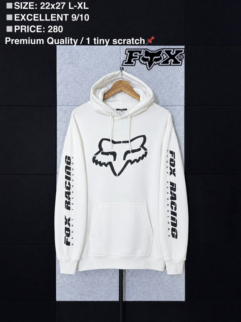 Fox Racing White Hoodie Sweatshirt (Category: Hoodies) located in San Rafael. Submitted by jules.ciao (Listing ID 1468714565, Image 1). Description: - Brand: White Fox Racing - Style: Pullover hoodie with drawstring hood and front kangaroo pocket - Design: Black logo graphic on front with lettering down both sleeves - Size: L-XL (22x7) - Ideal for: Super comfy everyday wear.
