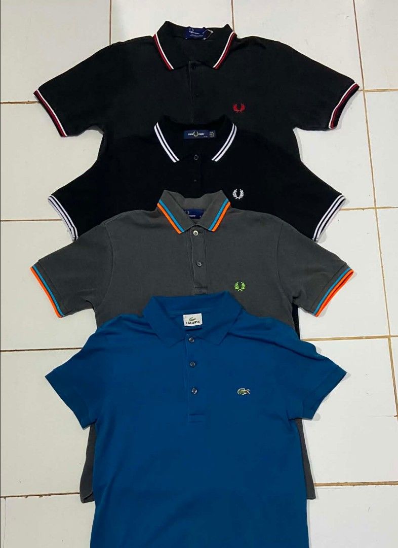 Fred Perry and Lacoste Polo Shirts Bundle (Category: Tshirts & Polo Shirts ) located in Zamboanga. Submitted by deiiiiiiiiiii (Listing ID 1468722854, Image 1). Description: - Set of 4 premium branded polo shirts - Includes 3 Fred Perry polos (black and grey, tipped collars) - Includes 1 blue Lacoste polo with iconic crocodile logo - Short sleeves with standard button plackets - Great smart-casual essentials - Selling as a bundle only.