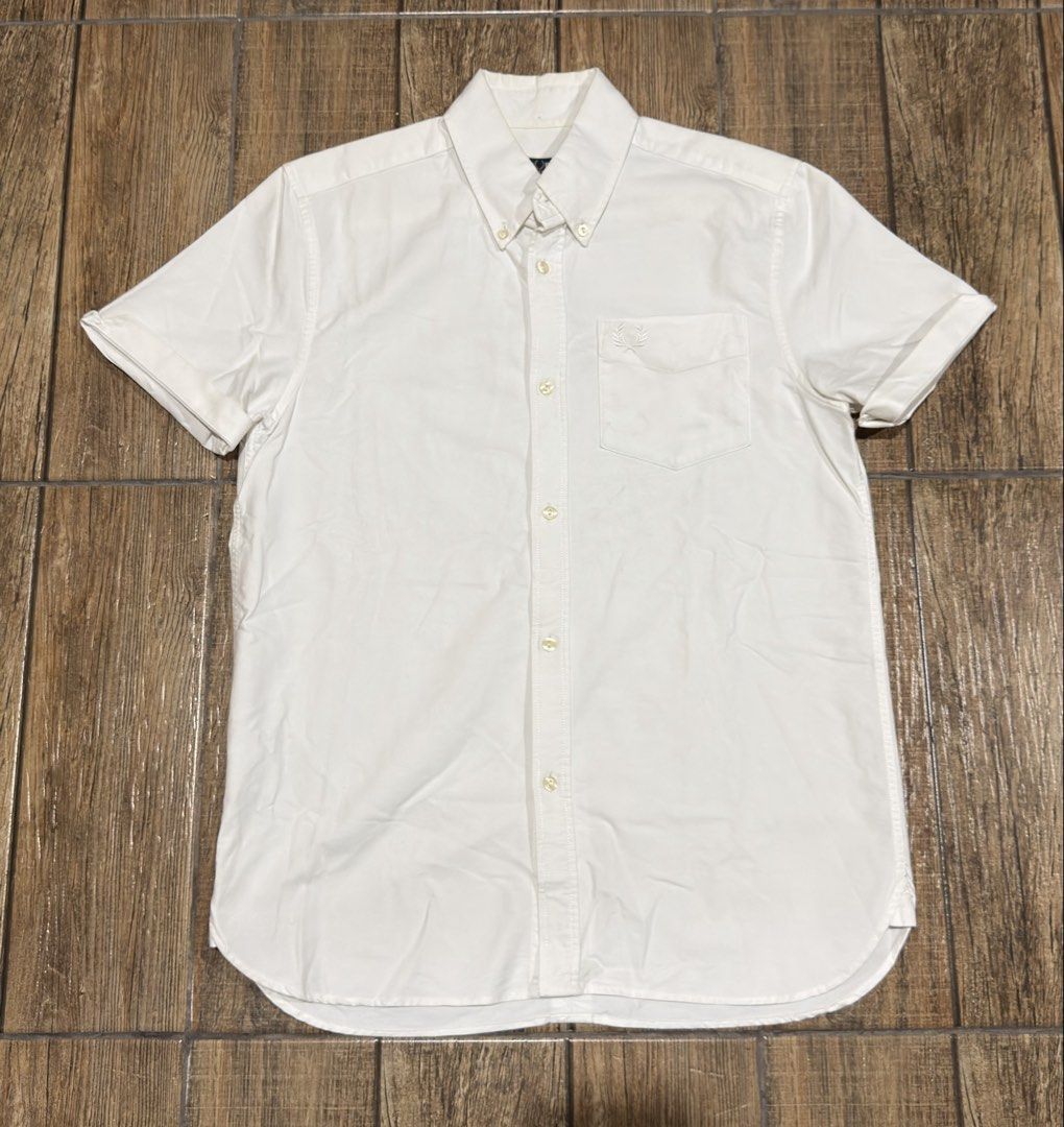 FRED PERRY WHITE LOGO POLO (Category: Tshirts & Polo Shirts ) located in Manila. Submitted by urban.vintage (Listing ID 1468870944, Image 1). Description: ISSUE: NONE (NEED WASH) MOP :GCASH (NO COD) SHIP VIA: LALAMOVE & J&T LOCATION: PASIG CITY LENGTH: 27 WIDTH : 20 .