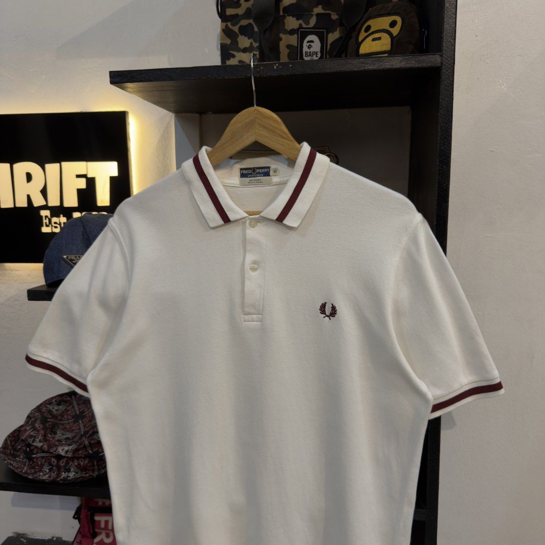 Fred Perry White Polo Shirt (Category: Tshirts & Polo Shirts ) located in Manila. Submitted by jerichomal82553 (Listing ID 1468906309, Image 2). Description: Fred Perry White Polo Shirt 21 by 28.5 Good Condition Complete Tags.