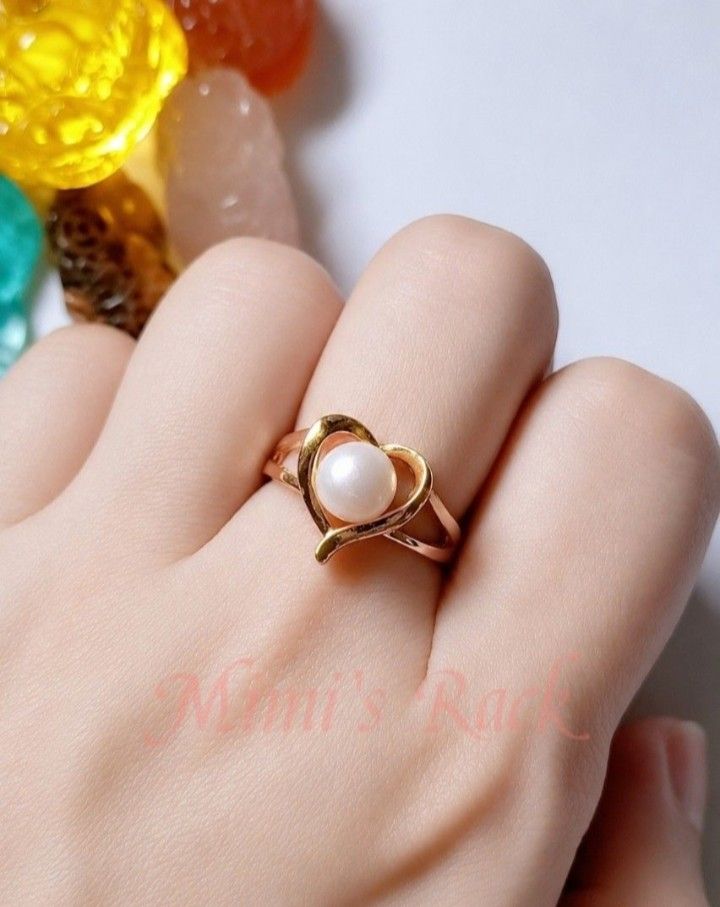 FRESHWATER PEARL GOLD RING HEART DESIGN (Category: Rings) located in Taguig. Submitted by mimisrack (Listing ID 1468928764, Image 3). Description: 🤍Soft. Elegant. Made for love. -Pearl for purity and feminine grace -Gold for warmth and timeless luxury -Heart design for love that lasts -Perfect for anniversaries, birthdays... or "just because." -Wear it and let your hands speak romance. 🧿 adjustable 🧿 pearl size: 7.5mm ▪️keep jewelries separate