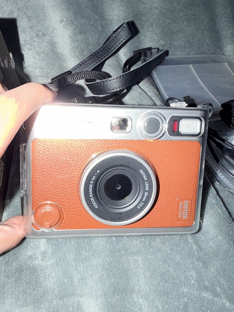 Fujifilm Instax Mini Evo (Category: Cameras) located in Malabon City. Submitted by stuffsxdeclutter (Listing ID 1468849426, Image 3). Description: INSTAX MINI EVO Inclusion: Instax Mini Evo Strap Manual Warranty Card Cord for charging Free Album Free Protective Case Free SD Card 32gb.