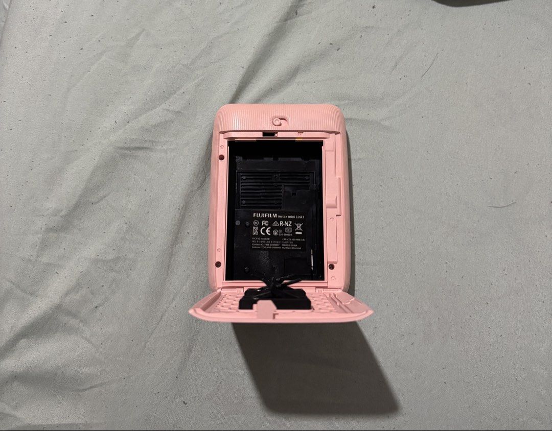 Fujifilm Instax Mini Link Smartphone Printer - Dusky Pink (Category: Cameras) located in Manila. Submitted by puredog.4308df (Listing ID 1468870051, Image 3). Description: This is a smartphone printer (Cheki printer) from the Cheki (Instax Mini) series. You can print with intuitive operations on the dedicated app (free)! It takes about 12 seconds from image data transfer completion to print output. When fully charged, it can continuously print ab