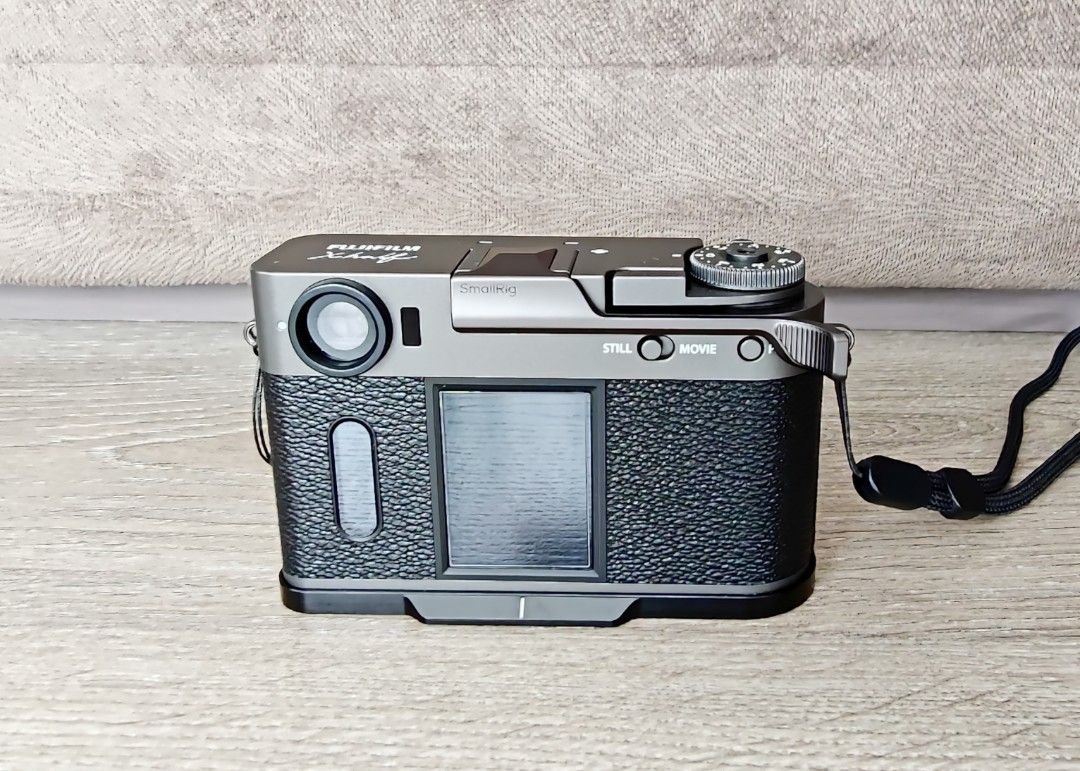 Fujifilm X Half Camera with SmallRig Case and Accessories (Category: Cameras) located in Manila. Submitted by ddxss (Listing ID 1468740821, Image 2). Description: Fujifilm X Half (Charcoal) - Accessories included: SmallRig half case grip and leather pouch, magnetic UV filter, CPL filter, lens hood, tempered glass for rear screen. Complete set with box. Bought December 31, 2025 seldom used around 1500 shutter count only. .