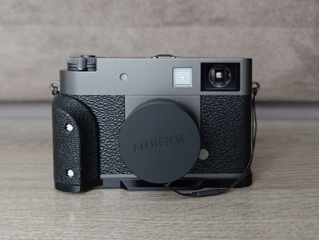 Fujifilm X Half Camera with SmallRig Case and Accessories (Category: Cameras) located in Manila. Submitted by ddxss (Listing ID 1468740821, Image 1). Description: Fujifilm X Half (Charcoal) - Accessories included: SmallRig half case grip and leather pouch, magnetic UV filter, CPL filter, lens hood, tempered glass for rear screen. Complete set with box. Bought December 31, 2025 seldom used around 1500 shutter count only. .