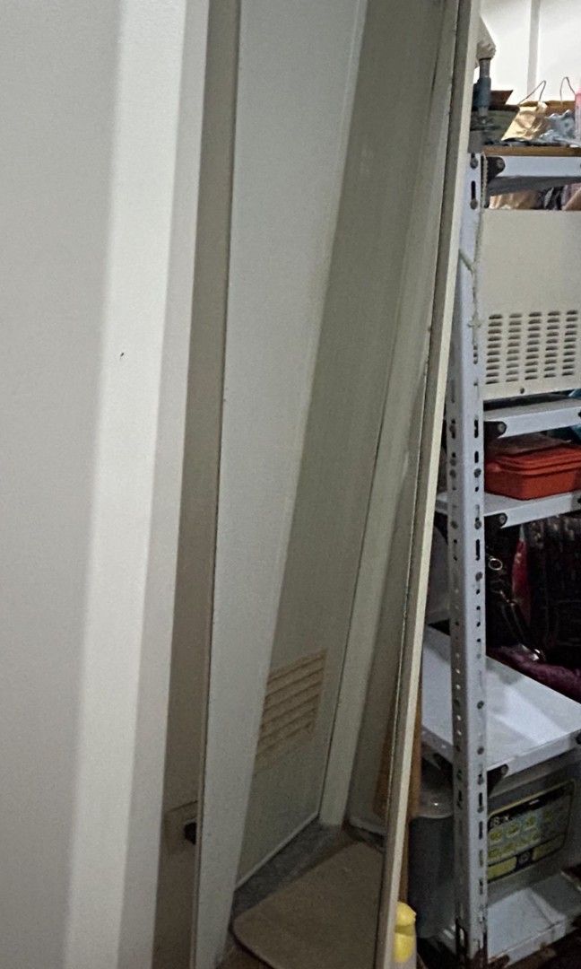 Full Length Standing Mirror with Storage Base (Category: Mirrors) located in Muntinlupa City. Submitted by claires_gallery (Listing ID 1468823116, Image 2). Description: selling as-is, makati area buyer to shoulder shipping fee available 1st week of november - Tall standing mirror with clean glass reflection - Sturdy rectangular base for stability - Neutral white frame complements any bedroom or dressing area - Space-saving design takes up minima
