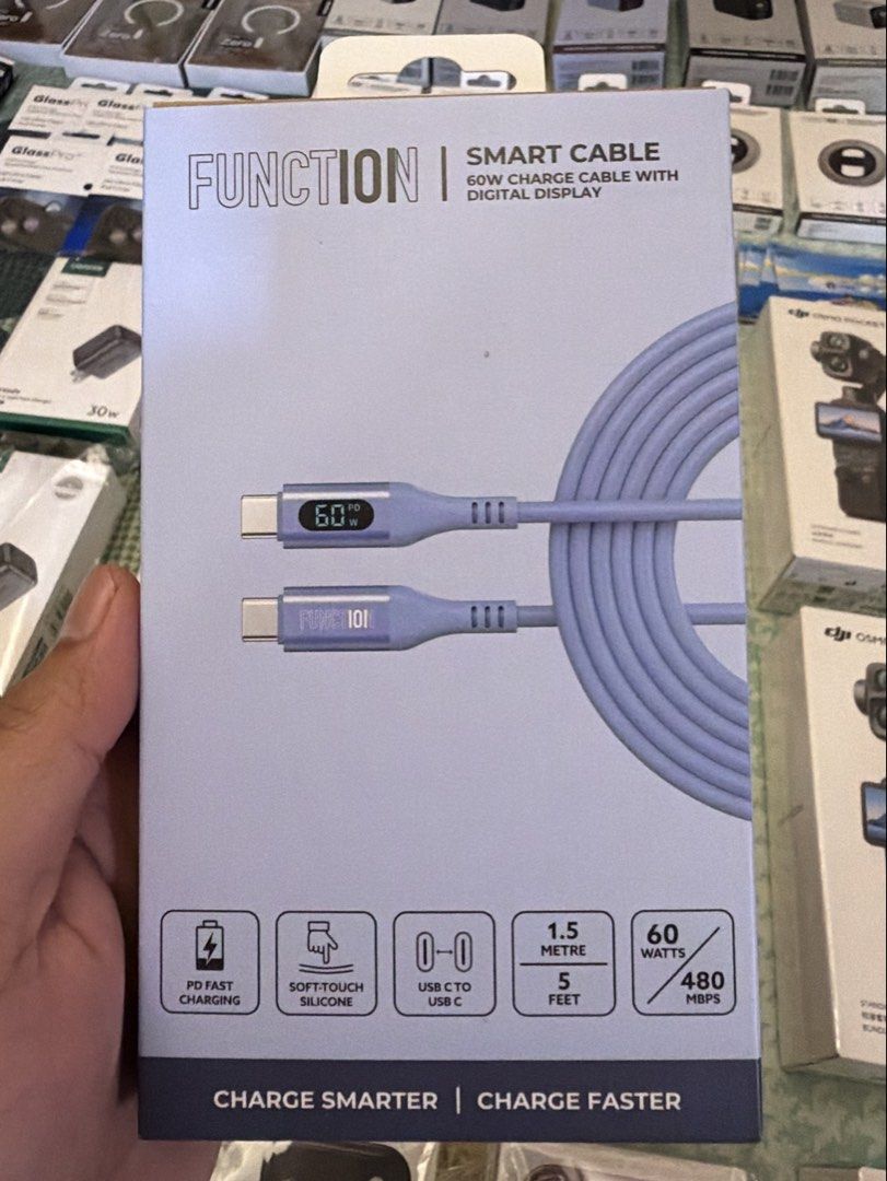 Function 101 Smart Cable (Category: Chargers & Cables) located in Quezon City. Submitted by law.1789 (Listing ID 1468880803, Image 1). Description: SRP - 590 Sale Price - 399 Function 101 Smart Cable - Type: USB-C to USB-C (60W PD Fast Charging) - Color: Light Blue - Length: 1.5 meters / 5 feet - Features: Built-in digital display to monitor charging speed, E-Mark intelligent chip, and 480 Mbps data transfer - Material: Premium soft-touch silicon