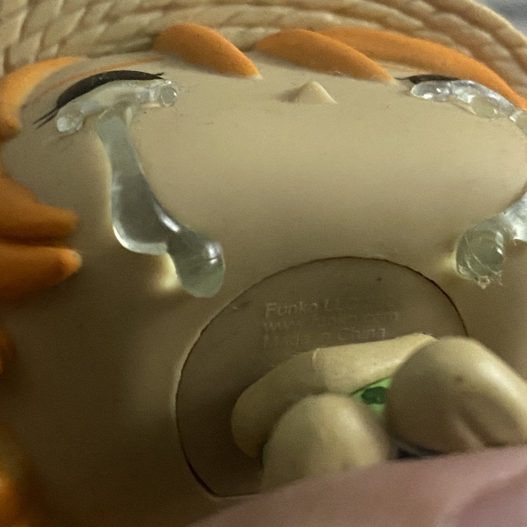 Funko Pop Animation One Piece Nami Crying Figure (Category: Designer & Blind Box Toys) located in Manila. Submitted by rumyewn (Listing ID 1468825959, Image 2). Description: - Character: Nami (Crying version) from One Piece - Details: Wearing her iconic straw hat and green patterned outfit with clear tear details - Condition: Loose figure without original box, stands nicely - Authenticity: Features official Funko LLC stamp underneath the head - P