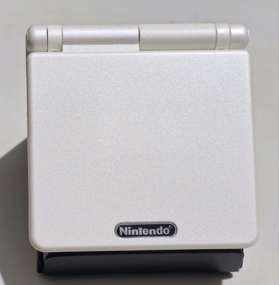 Gameboy Advance SP IPS LCD (Category: Nintendo) located in Santa Rosa. Submitted by j.r.constantino (Listing ID 1468834246, Image 2). Description: 📣 For sale Gameboy Advance SP 📣 🏷️ ₱6,500 fixed ➡️ AGS-001 model ➡️ New IPS screen v4 (adjustable to 15 levels of brightness) ➡️ New white shell ➡️ Loud sounds (new capacitor) ➡️ All buttons are crisp and working ➡️ EXT and charging port are working ➡️ With new battery and original nintendo charger 