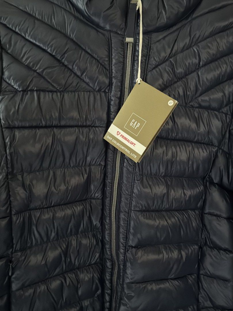 Gap ColdControl Lite Puffer Jacket Navy Blue (Category: Coats, Jackets and Outerwear) located in Dolores. Submitted by zareeena (Listing ID 1468732939, Image 2). Description: - Brand new with original tags attached (Never worn) - Color: Dark navy blue - Tech: ColdControl Lite with PrimaLoft warm fill (35% recycled fibers) SIZE SMALL .