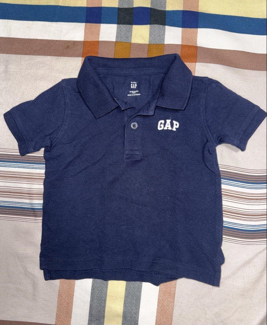GAP Polo Shirt (Category: Babies & Kids Fashion) located in Manila. Submitted by krisandrei (Listing ID 1468864793, Image 2). Description: Set of 2 Size: 12-18mos 80cm 100% cotton Color: white and navy blue Slightly used. No damage, see pictures above..