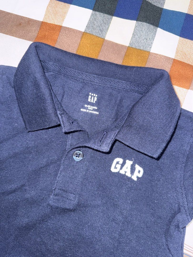 GAP Polo Shirt (Category: Babies & Kids Fashion) located in Manila. Submitted by krisandrei (Listing ID 1468864793, Image 3). Description: Set of 2 Size: 12-18mos 80cm 100% cotton Color: white and navy blue Slightly used. No damage, see pictures above..