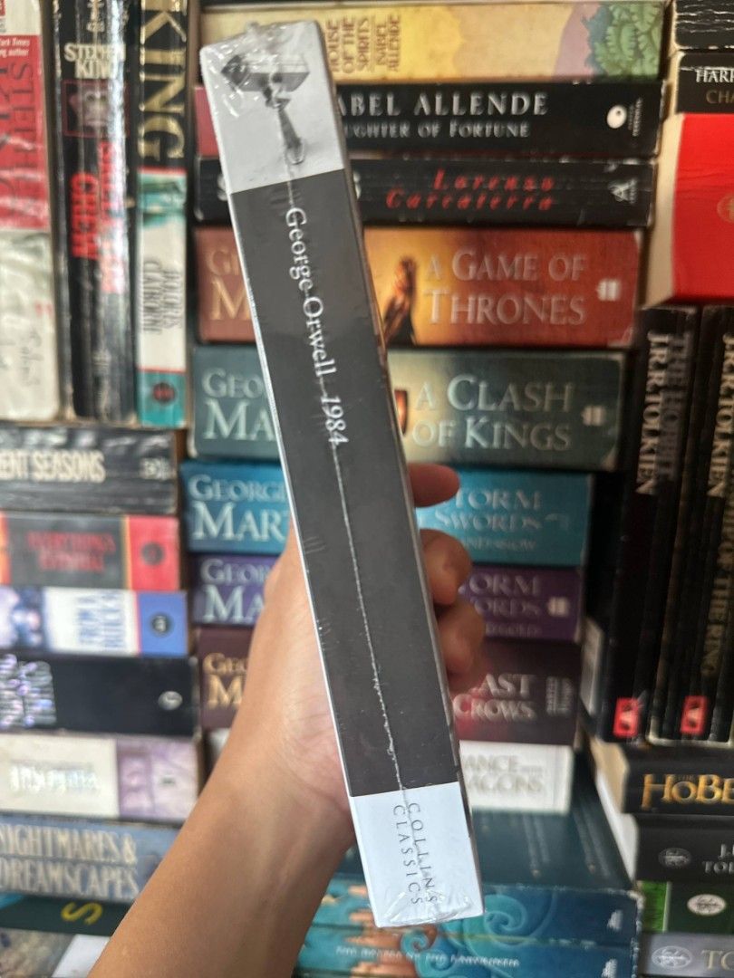 George Orwell 1984 Collins Classics Paperback Book (Category: Storybooks) located in Imus. Submitted by t0t3fairi3 (Listing ID 1468737092, Image 3). Description: Brand new, unread copy of George Orwell's 1984 by Collins Classics. Still in plastic shrink wrap, featuring a special Life and Times section and glossary. Perfect for your bookshelf or as a gift!.