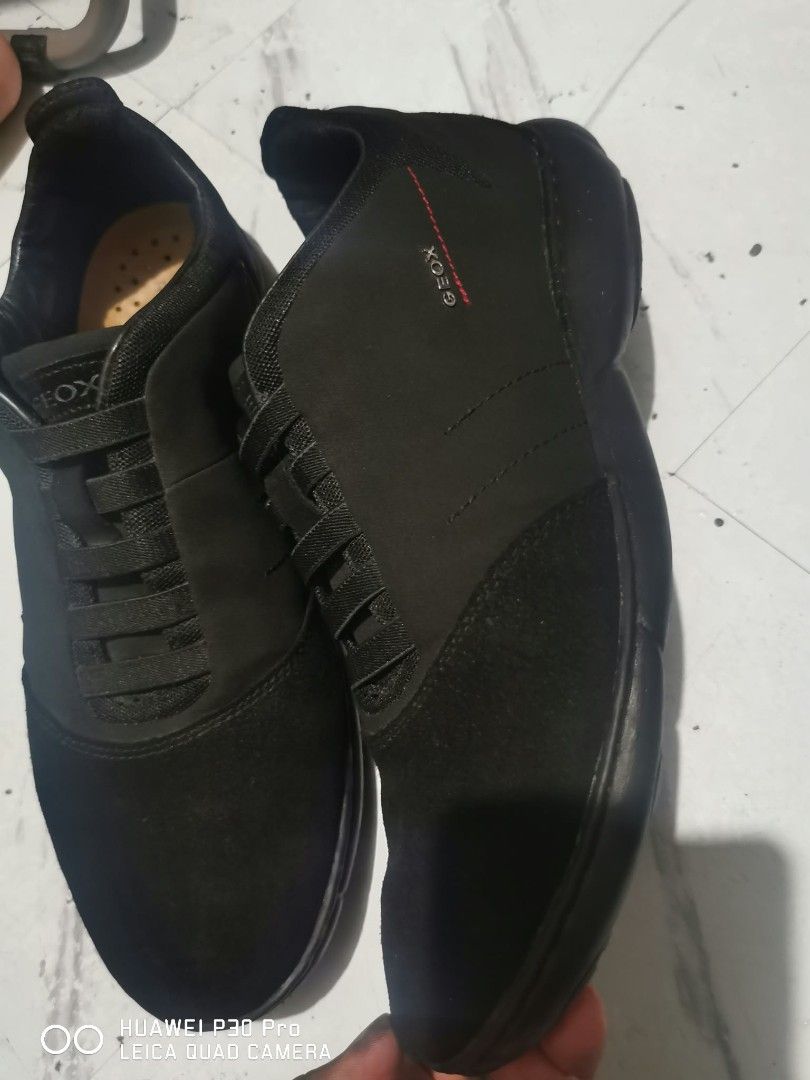 Geox Spira Black Net Breathing System Sneakers (Category: Sneakers) located in Makati City. Submitted by relianzmae57131 (Listing ID 1468833522, Image 2). Description: - Brand: Geox Spira Sneakers - Color: Black with red outsole accents - Size: UK 8 / EUR 42 / US 9 - Upper Material: Suede and textile - Design: Slip-on with convenient elastic laces - Technology: Net breathing system sole to keep feet cool - Condition: Shows some wear on the bottom