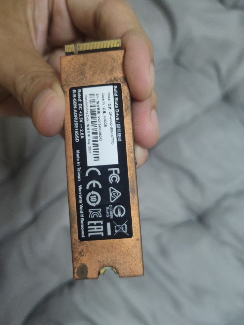 Gigabyte AORUS NVMe Gen4 SSD 2TB (Category: Computer Parts) located in Quezon City. Submitted by dellybells03 (Listing ID 1468890003, Image 3). Description: - Capacity: Massive 2TB storage - Interface: NVMe Gen4 M.2 2280 - Cooling: Built-in copper heatsink for superior thermal performance - Compatibility: Ideal for high-end PC storage or PS5 expansion - Condition: Clean pins, tested, and ready to install - Mfg Date: August 2021.