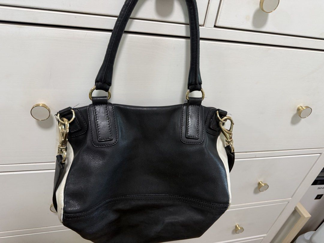 Givenchy Multicolor Leather Satchel Shoulder Bag (Category: Luxury Bags & Wallets) located in Taguig. Submitted by riacalleja1 (Listing ID 1468765812, Image 2). Description: Givenchy Pandora Small Tricolor Leather Bag – Black / Beige / Cream ₱18,000 | Negotiable Selling my authentic Givenchy Pandora Small Tricolor leather bag. Distinctive multi-zipper design with contrasting leather panels, gold-tone hardware and a relaxed silhouette. Condition: 