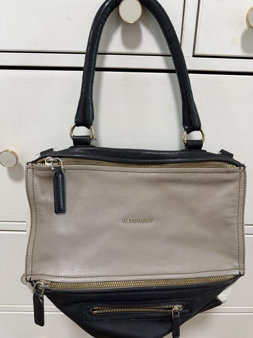 Givenchy Multicolor Leather Satchel Shoulder Bag (Category: Luxury Bags & Wallets) located in Taguig. Submitted by riacalleja1 (Listing ID 1468765812, Image 1). Description: Givenchy Pandora Small Tricolor Leather Bag – Black / Beige / Cream ₱18,000 | Negotiable Selling my authentic Givenchy Pandora Small Tricolor leather bag. Distinctive multi-zipper design with contrasting leather panels, gold-tone hardware and a relaxed silhouette. Condition: 