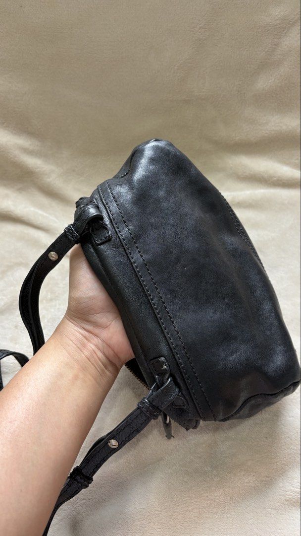 Givenchy Studded Pandora Bag (Category: Luxury Bags & Wallets) located in Quezon City. Submitted by heynutcase (Listing ID 1468757391, Image 2). Description: Givenchy Pandora Mini - - Super BUTTERY soft leather - Strap needs replacement/repair - Some metal studs are loose - Interior: Black fabric lining, well kept - Compact size, perfect for everyday wear.