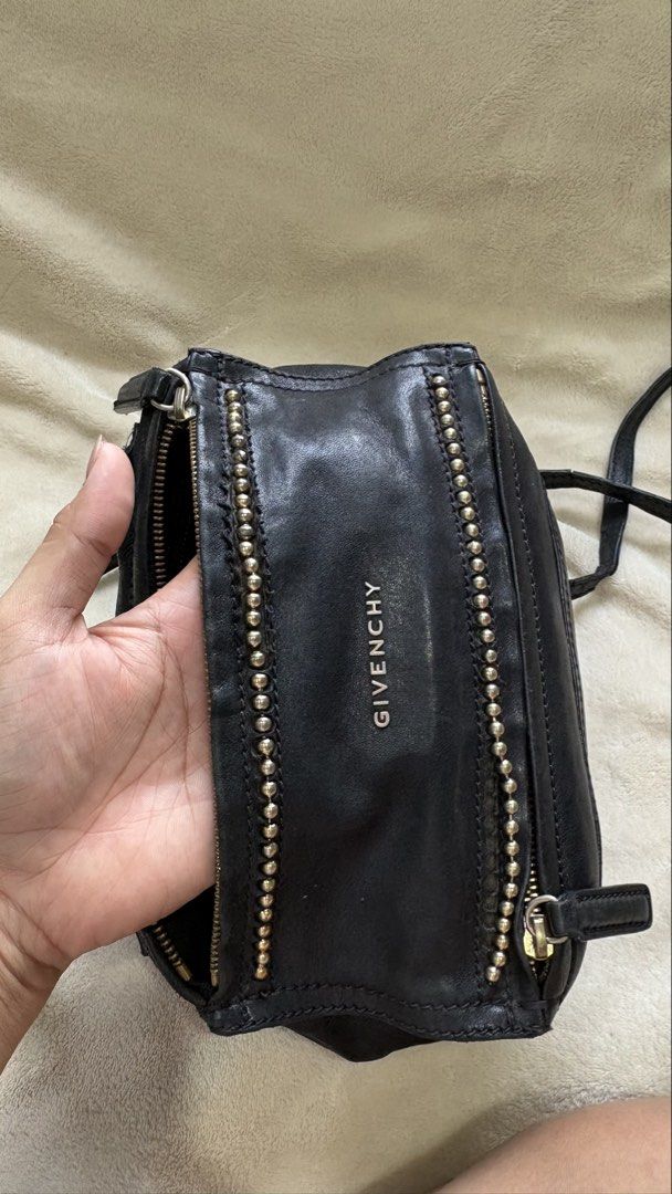 Givenchy Studded Pandora Bag (Category: Luxury Bags & Wallets) located in Quezon City. Submitted by heynutcase (Listing ID 1468757391, Image 1). Description: Givenchy Pandora Mini - - Super BUTTERY soft leather - Strap needs replacement/repair - Some metal studs are loose - Interior: Black fabric lining, well kept - Compact size, perfect for everyday wear.