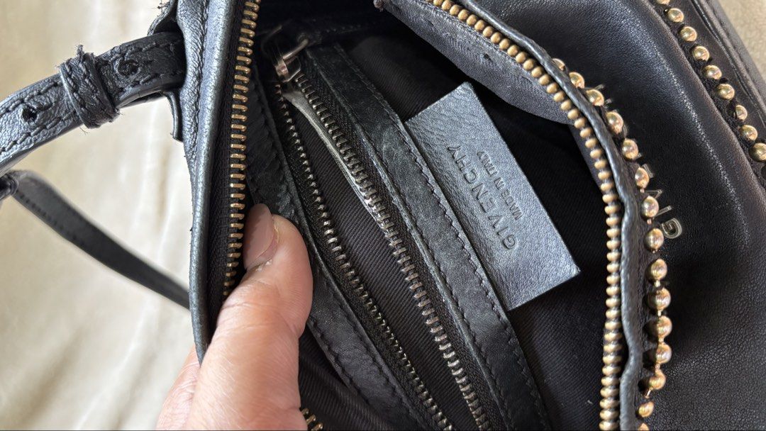 Givenchy Studded Pandora Bag (Category: Luxury Bags & Wallets) located in Quezon City. Submitted by heynutcase (Listing ID 1468757391, Image 3). Description: Givenchy Pandora Mini - - Super BUTTERY soft leather - Strap needs replacement/repair - Some metal studs are loose - Interior: Black fabric lining, well kept - Compact size, perfect for everyday wear.