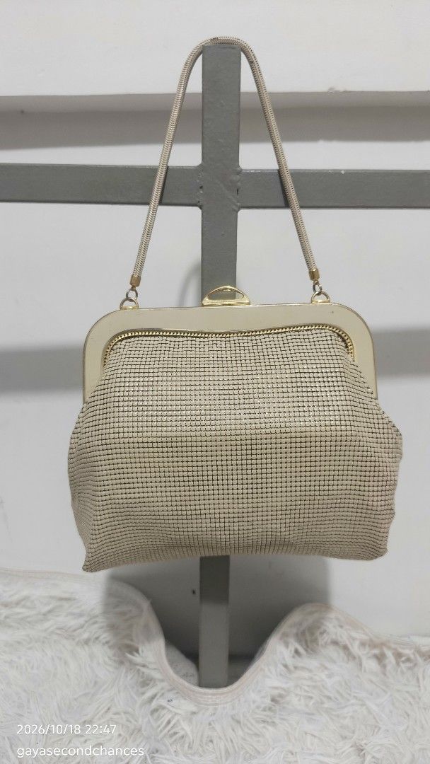 GLOMESH AUSTRALIA MESH BAG (Category: Purses & Pouches) located in Kalibo. Submitted by secondchances.thriftsh8p (Listing ID 1468890888, Image 1). Description: - Style: Vintage cream mesh handbag with a subtle metallic sheen - Hardware: Structured gold-tone metal frame with secure kiss-lock closure - Handle: Single braided top handle - Capacity: Compact size, fits small essentials like phone and keys - Occasion: Great for parties, dinners, or ret