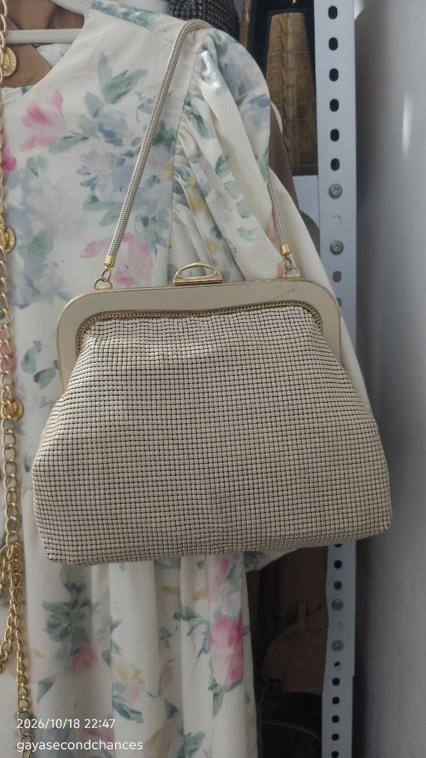 GLOMESH AUSTRALIA MESH BAG (Category: Purses & Pouches) located in Kalibo. Submitted by secondchances.thriftsh8p (Listing ID 1468890888, Image 3). Description: - Style: Vintage cream mesh handbag with a subtle metallic sheen - Hardware: Structured gold-tone metal frame with secure kiss-lock closure - Handle: Single braided top handle - Capacity: Compact size, fits small essentials like phone and keys - Occasion: Great for parties, dinners, or ret