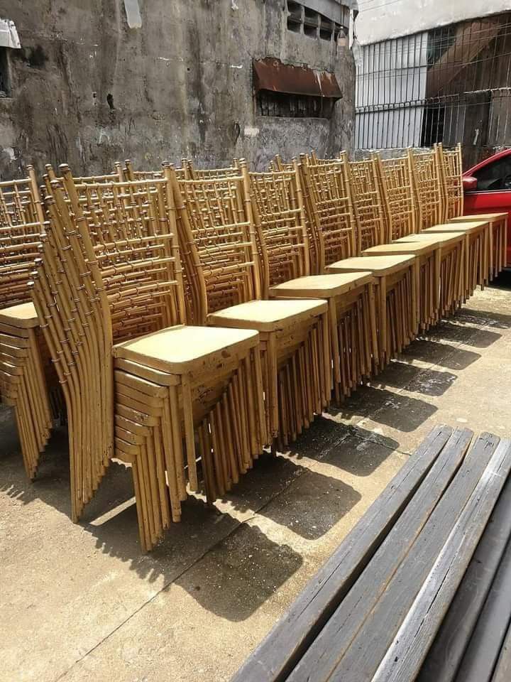 Tifanny chair for rent (Category: Chairs) located in Quezon City. Submitted by bjorn02 (Listing ID 1468853587, Image 1). Description: - Set of gold Chiavari chairs, perfect for weddings, parties, and catering businesses - Classic bamboo-style frame with a durable painted gold finish - Sturdy metal build equipped with comfortable flat cushioned seats - Neatly stackable for easy storage and transport - Shows minor scuffs and wear from regular use, 