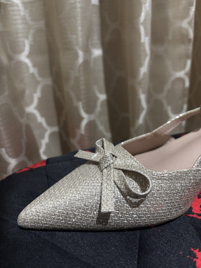Gold Glitter Slingback Kitten Heels Size 7 (Category: Heels) located in Daraga. Submitted by declutt.heart (Listing ID 1468839371, Image 2). Description: Used once for graduation Good as new Store bought Original price: 1k RFS: Decluttering.