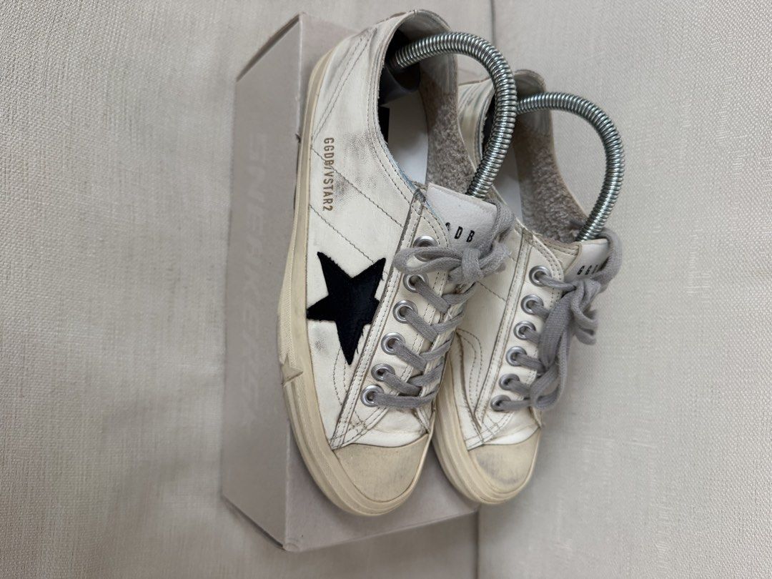 GOLDEN GOOSE VSTAR2 AUTHENTIC SIZE 38 (Category: Sneakers) located in Muntinlupa City. Submitted by king_declutter (Listing ID 1468722308, Image 2). Description: FOR SALE: AUTHENTIC GOLDEN GOOSE VSTAR2 SIZE: 38 CONDITION: SLIGHTLY USED COMPLETE WITH DUST BAG PASSPORT, ETC. COLOR: OFFWHITE WITH BLACK STAR/LOGO RFS: DECLUTTERRING SELLING PRICE: P15K retails for around P30k.